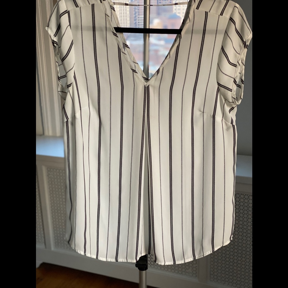White and black blouse.